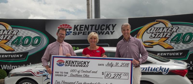 Left to right - Lance Erwin, Director of Ticket Sales & Services, Kentucky Speedway; Sherry Ems, Executive Director USO Central and Southern Ohio; Mark Simendinger, General Manager, Kentucky Speedway